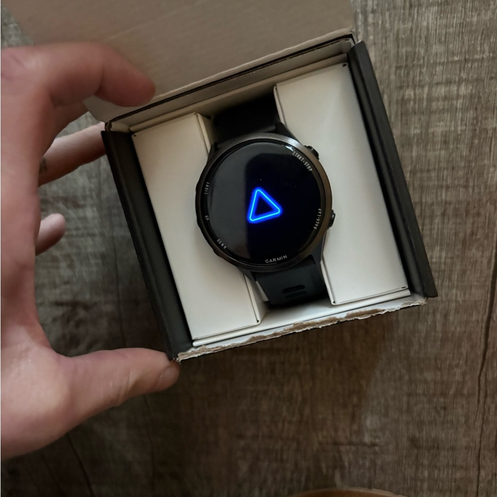 Garmin Forerunner 570, brand new wore it for two weeks.